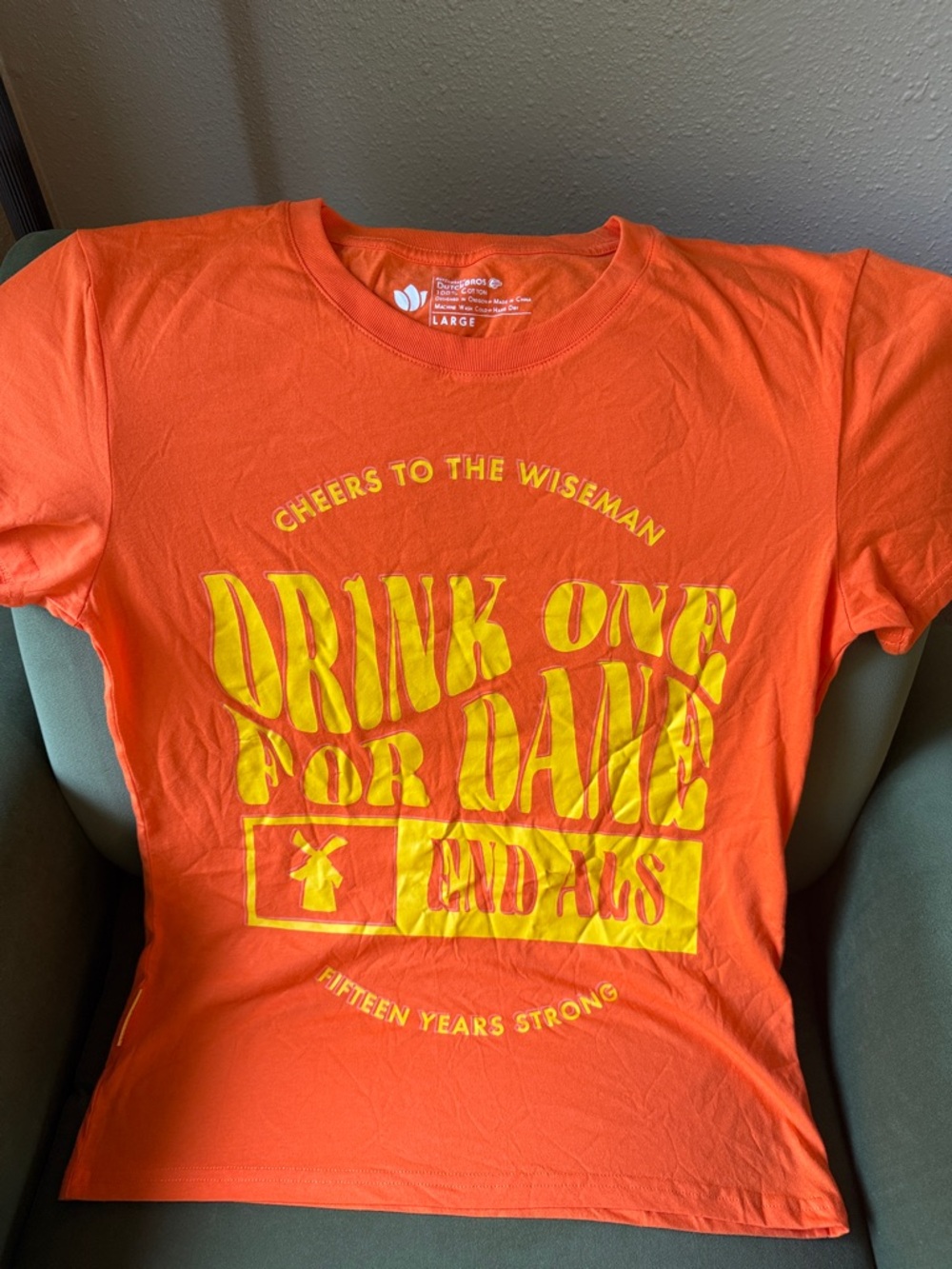 Dutch Bros Orange Short Sleeve Tee with Yellow Graphic